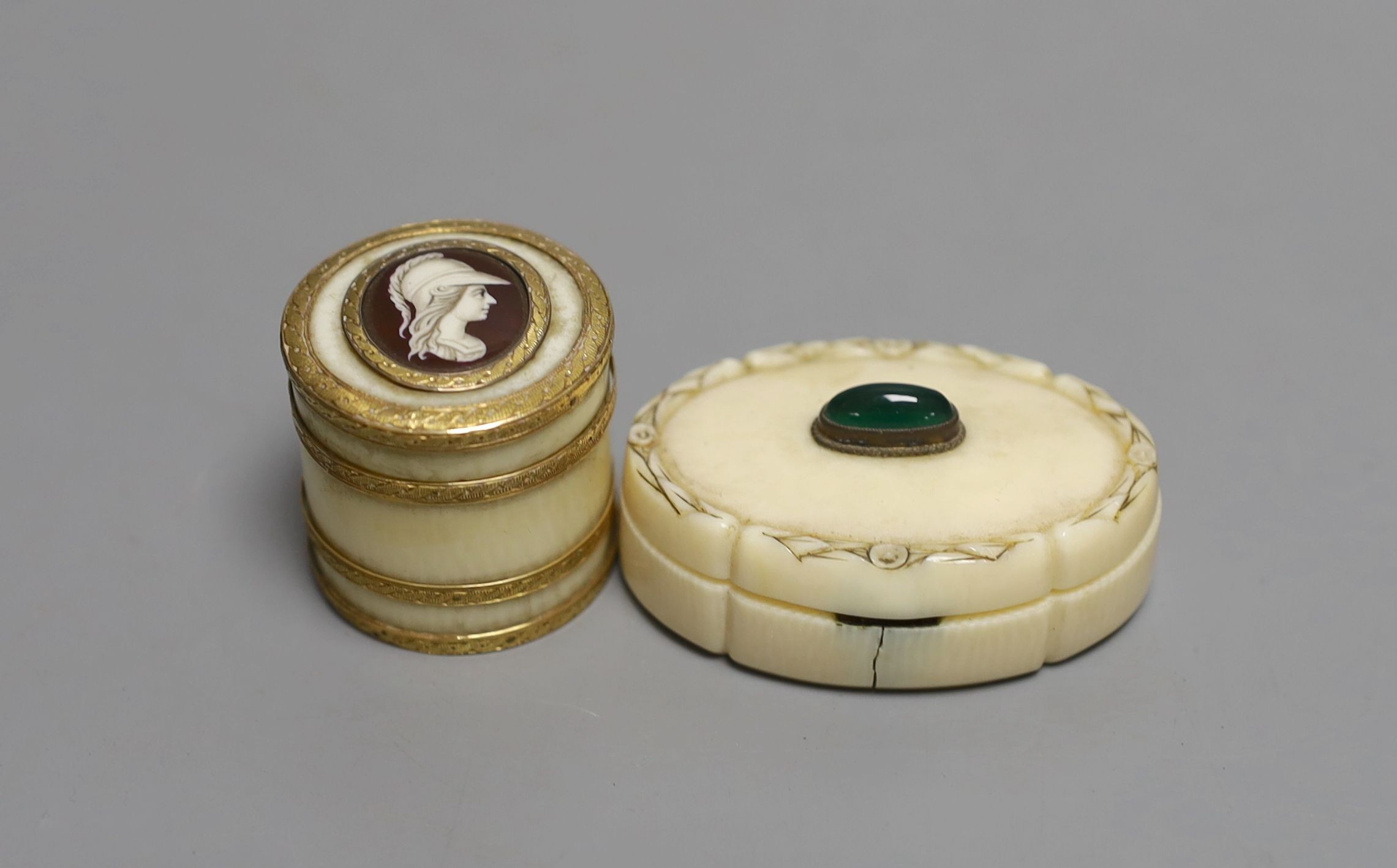 An 18th century yellow metal banded ivory counter box and oval ivory green cabochon mounted snuff box, Counter box 3cms high.